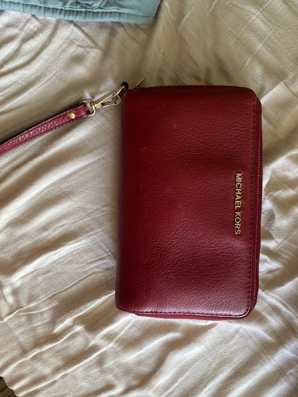 Michael Kors Burgundy Leather Zip Wristlet with Gold Hardware
